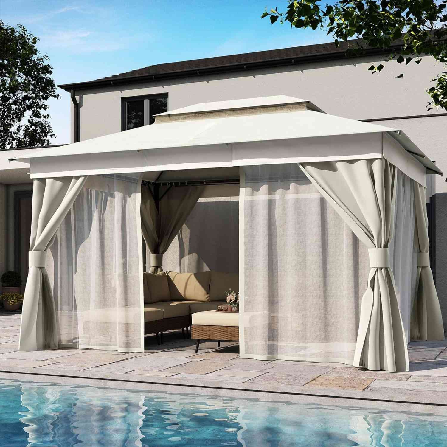 A white and gray gazebo in a backyard with a pool