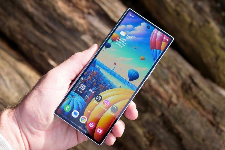 A person holding the closed Samsung Galaxy Z Fold 6.