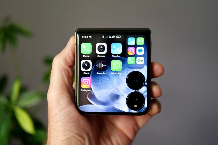 A person holding the Xiaomi Mix Flip.