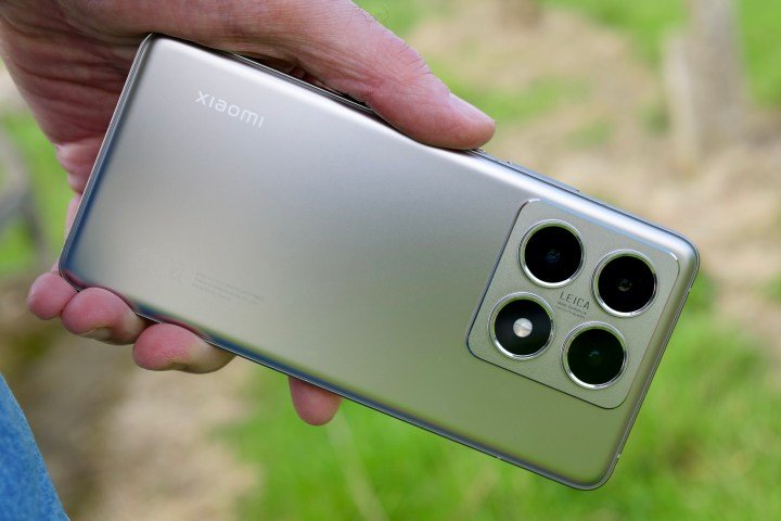 A person holding the Xiaomi 14T Pro.