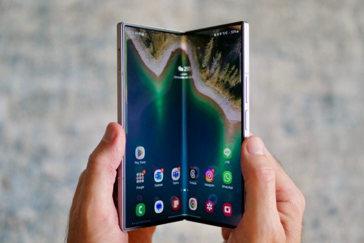 A person opening the Samsung Galaxy Z Fold 6.