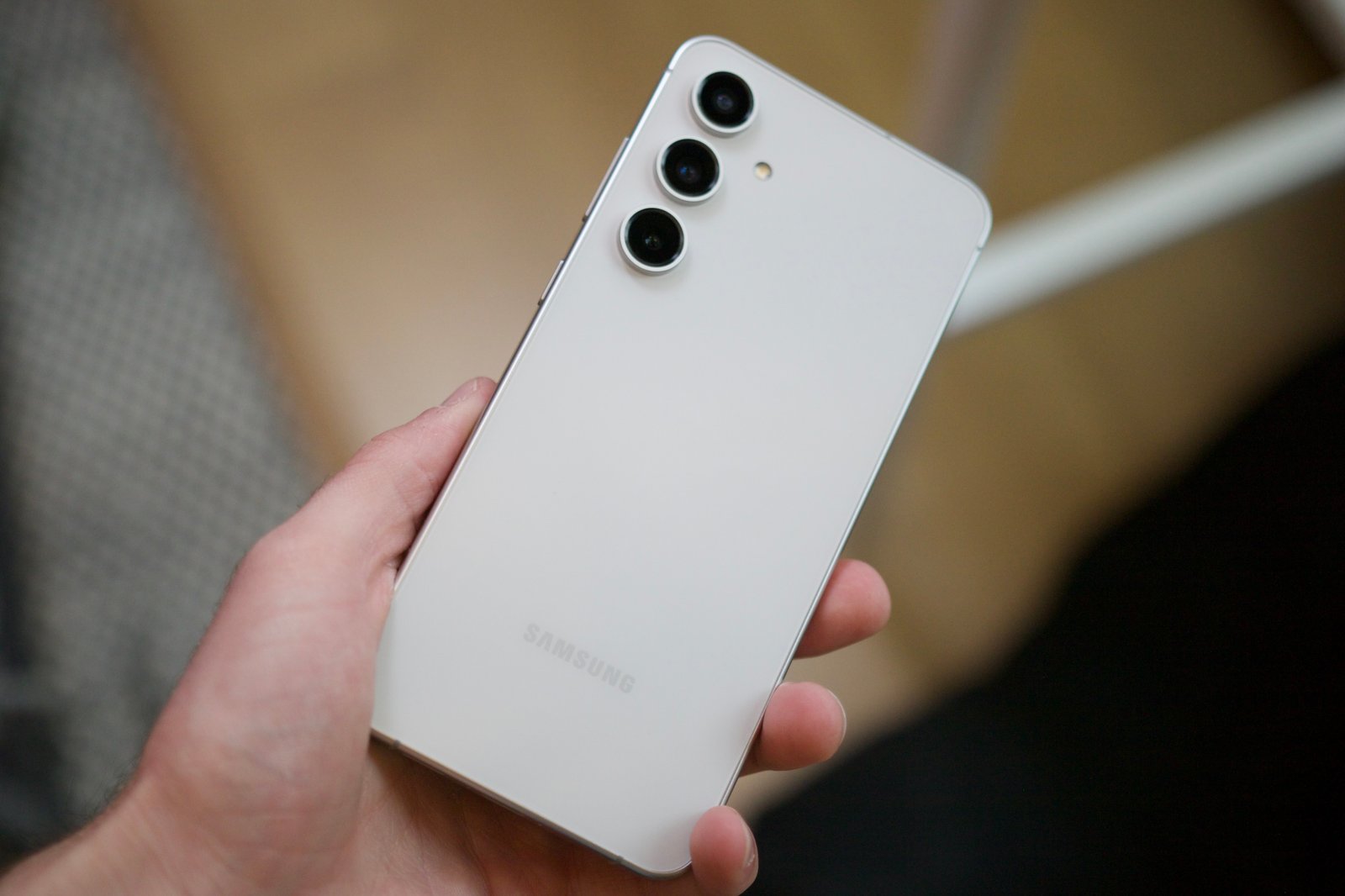 Someone holding the Galaxy S24 FE.