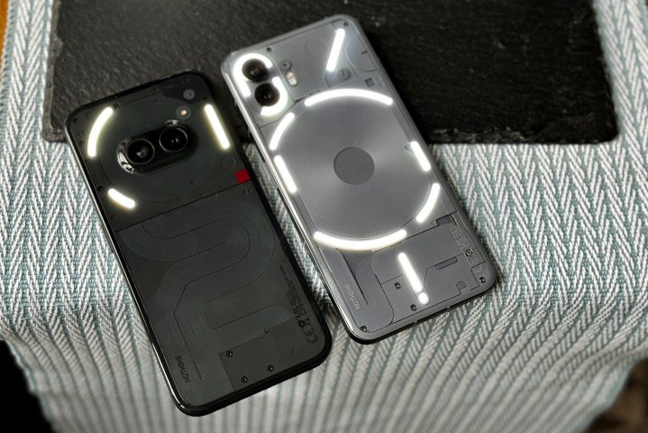 The Nothing Phone 2a and the Nothing Phone 2 with Glyph Lights active.