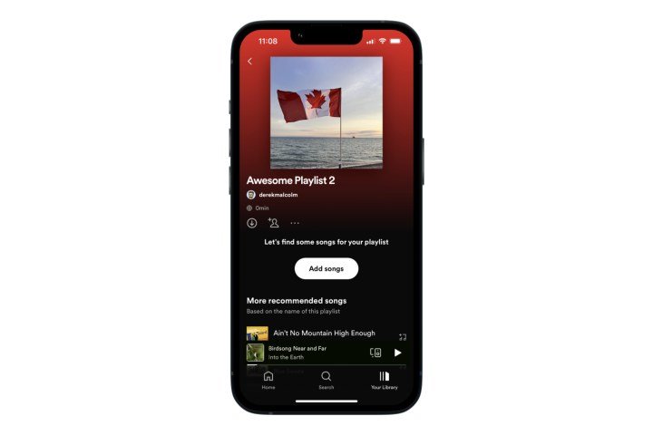 The "Add Songs" button on Spotify mobile app.