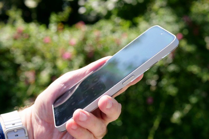 A person holding the Nothing Phone 2a Plus.
