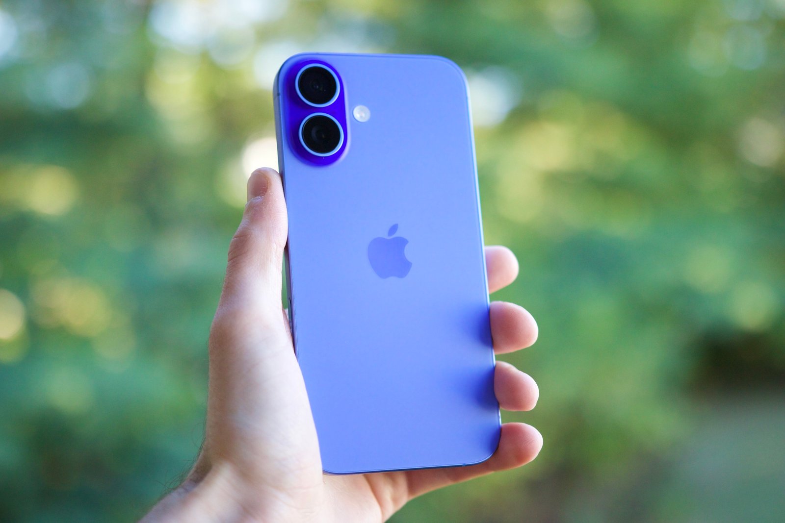 Someone holding the iPhone 16.