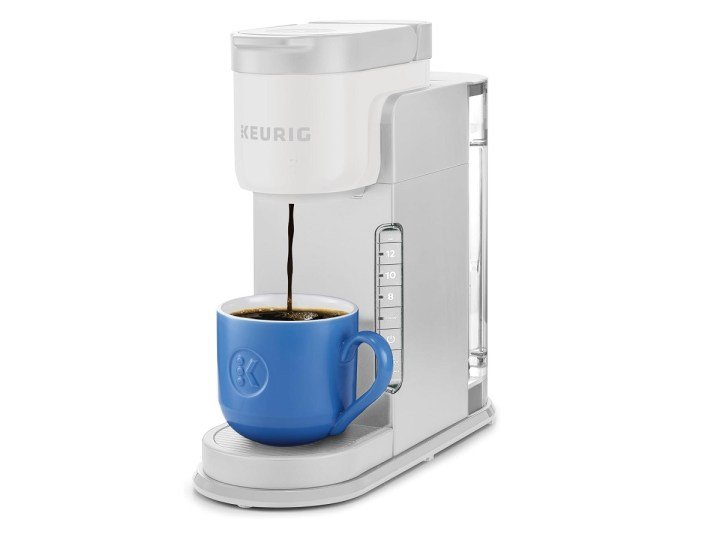 The Keurig K-Express coffee maker brewing a cup of coffee.