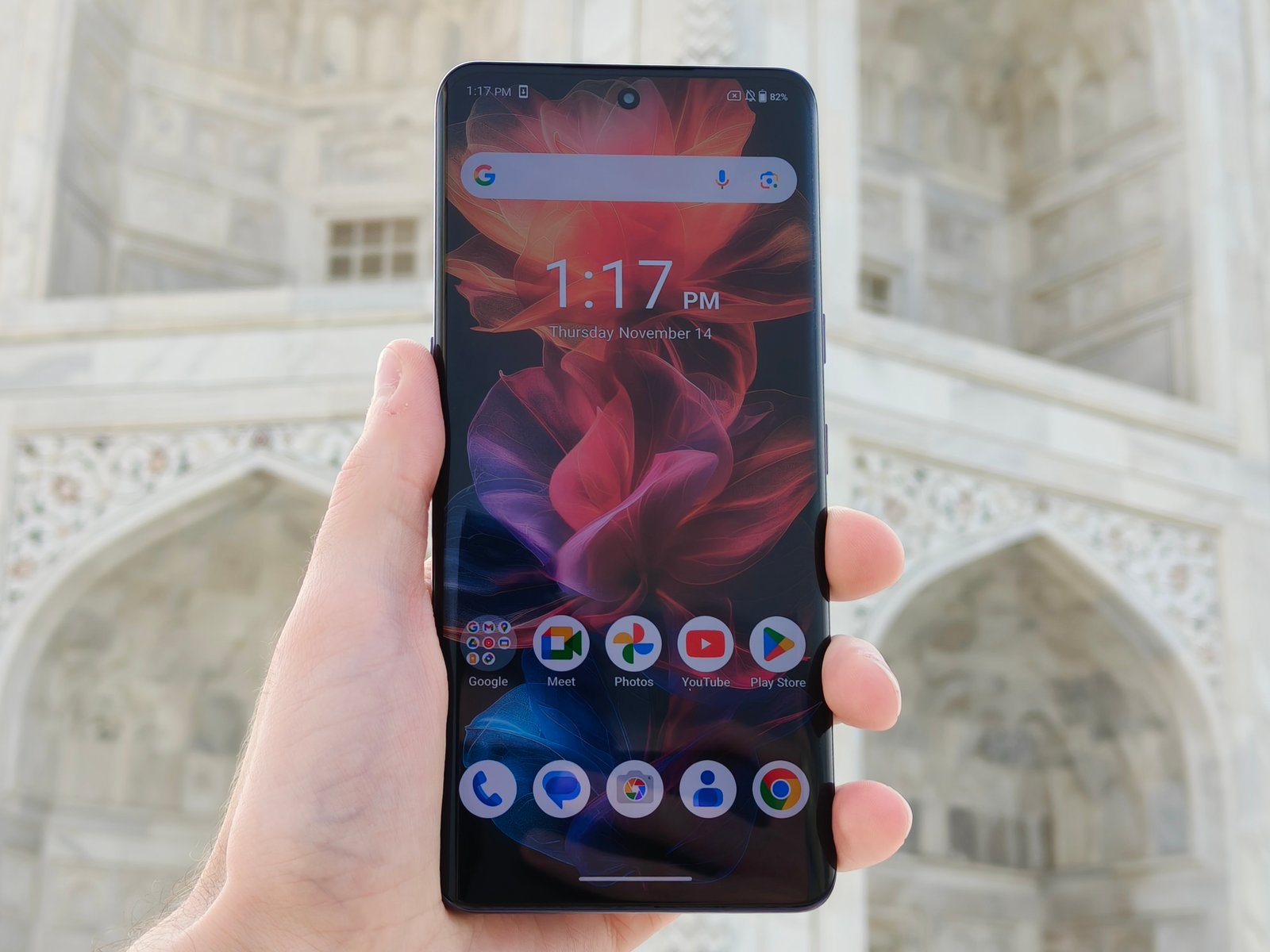 Someone holding the Lava Agni 3 smartphone with the screen turned on.