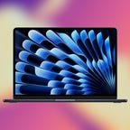 An open, forward facing MacBook Air against an abstract purple and orange background. 
