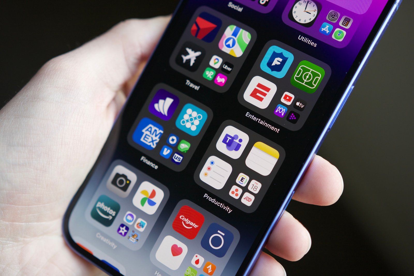 A close-up view of the App Library page on the iPhone 16.