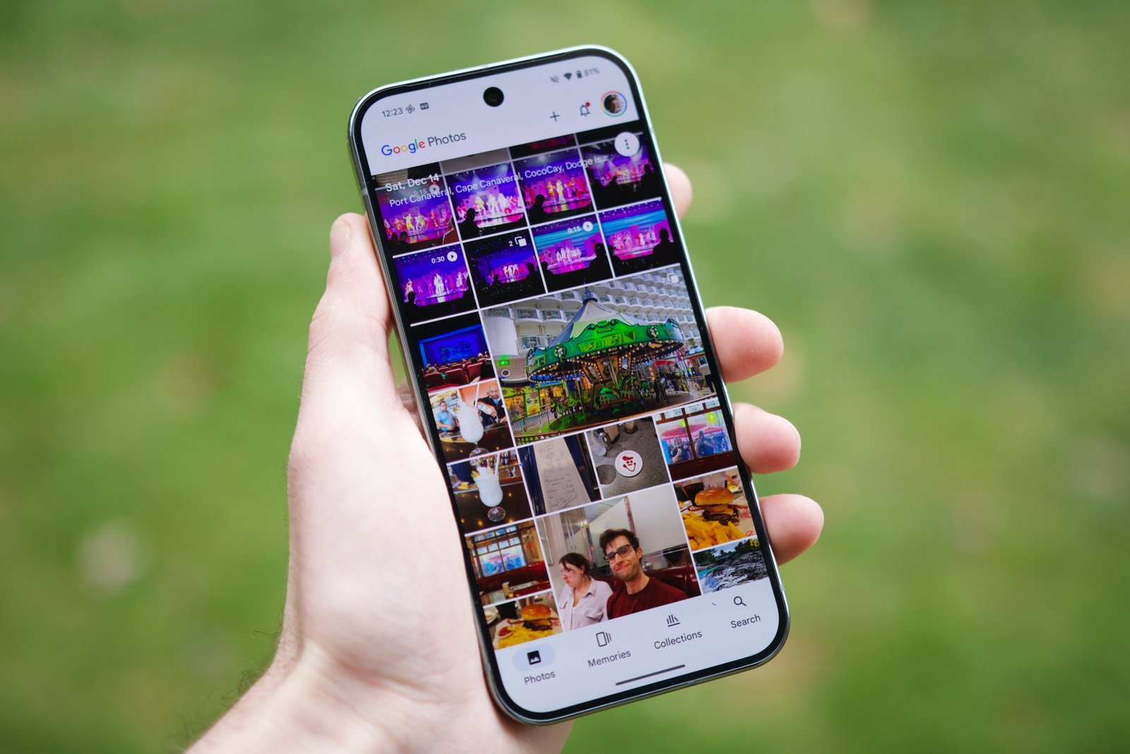 Someone holding a Pixel 9 Pro, running the Google Photos app.
