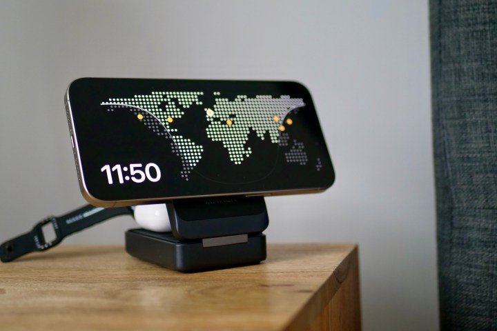 The iPhone 15 Pro Max with Standby mode on the Anker MagGo Wireless Charging Station.