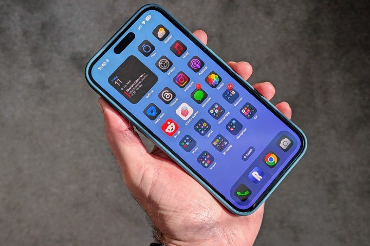 The Apple iPhone 16 Plus's home screen with Dark mode icons.