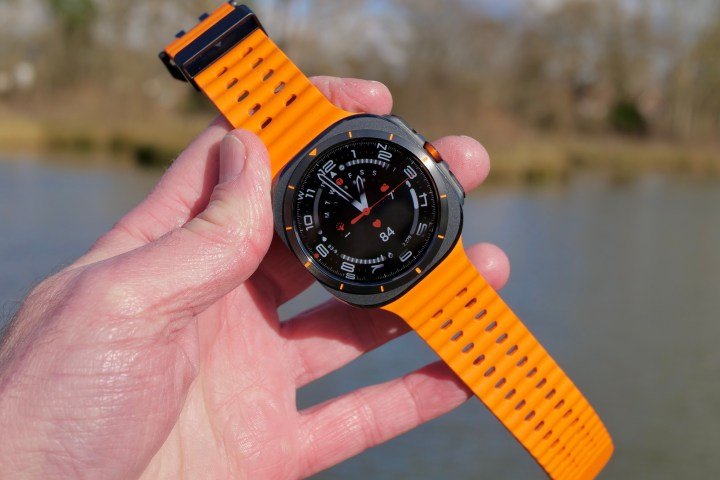 A person holding the Samsung Galaxy Watch Ultra.