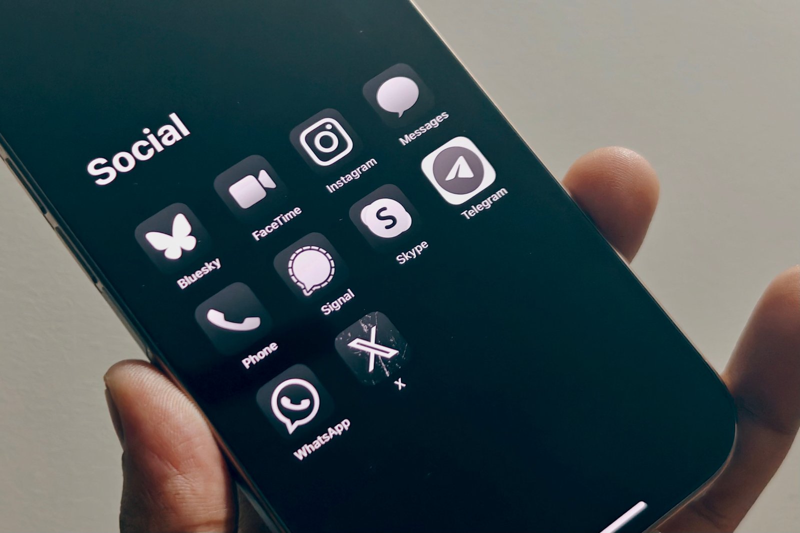 Social media apps on an iPhone.
