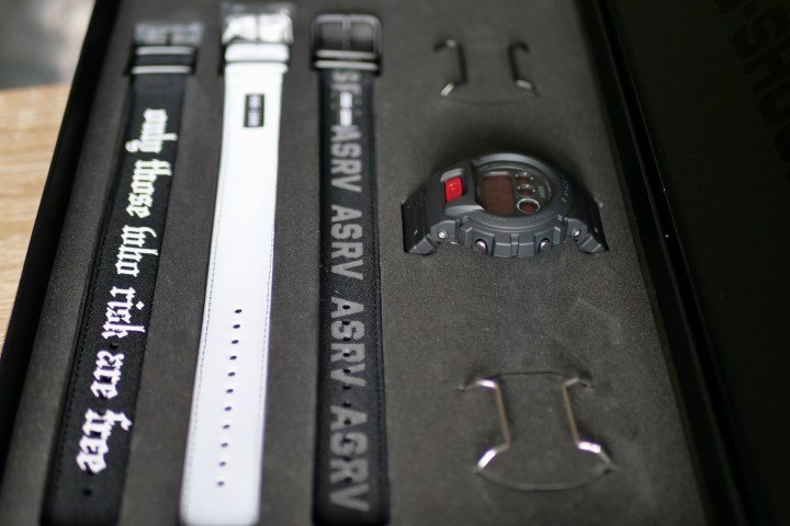 The G-Shock x ASRV DW-6900 with accessories in its box.