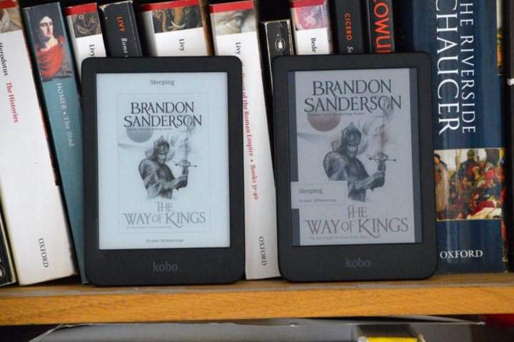 The Kobo Clara BW next to the Kobo Clara Colour on a bookshelf.