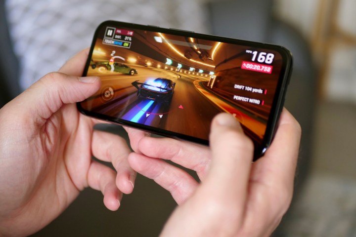 A person playing a game on the Google Pixel 8a.