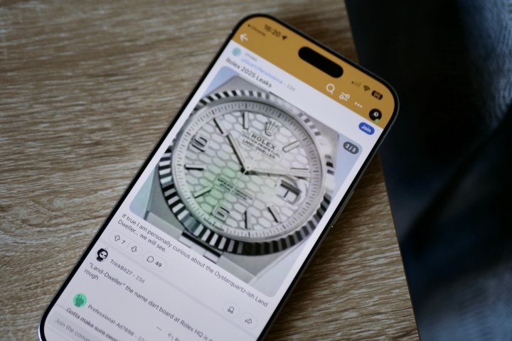 An iPhone 16 Pro Max showing a leaked image of the Rolex Land Dweller.