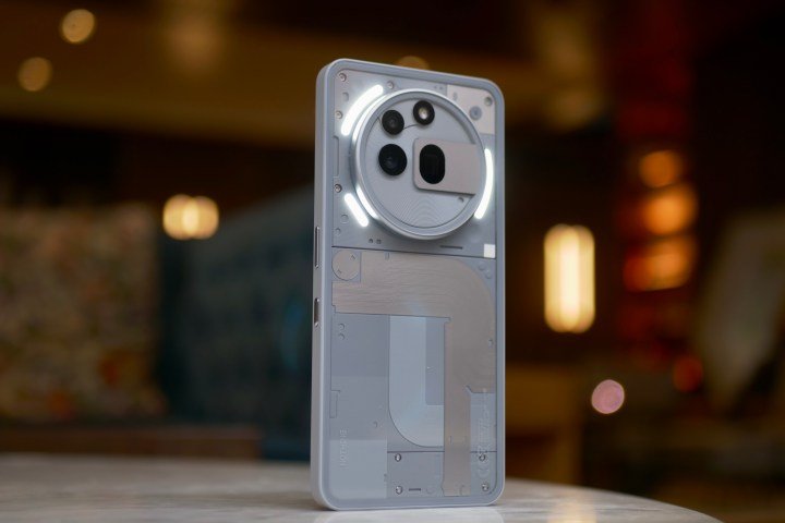 The back of the Nothing Phone 3a Pro, with the Glyph Lights active.
