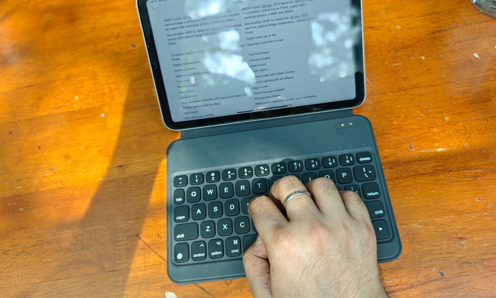 Typing on the HOU Keyboard for the iPad mini.