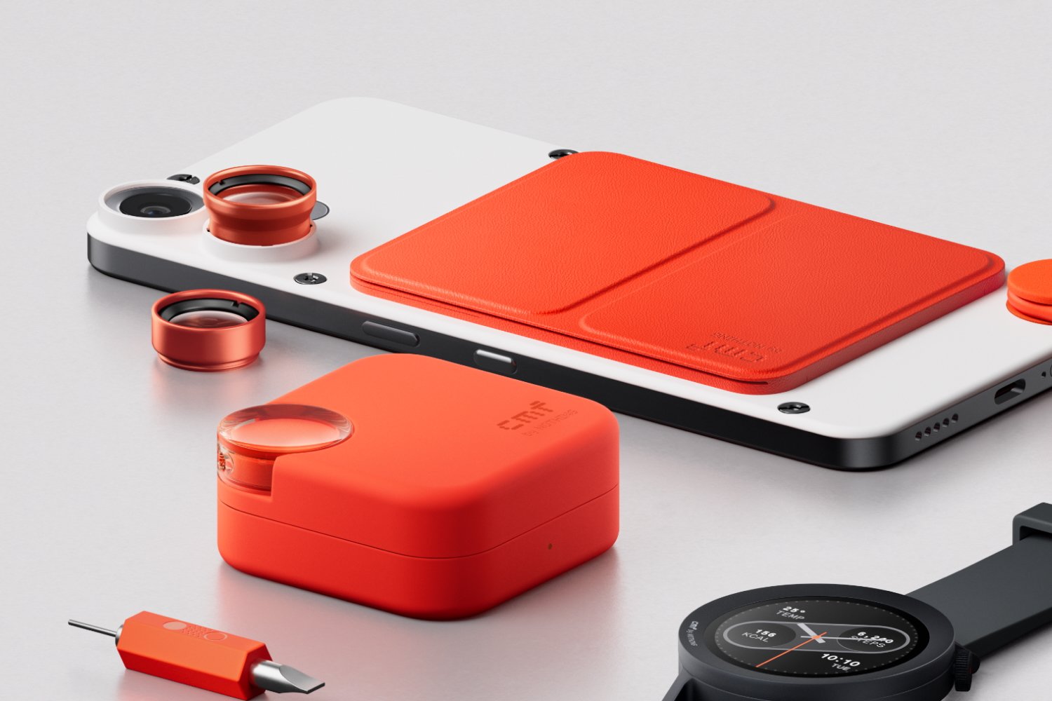 The CMF Phone 2 Pro with a set of CMF earbuds.