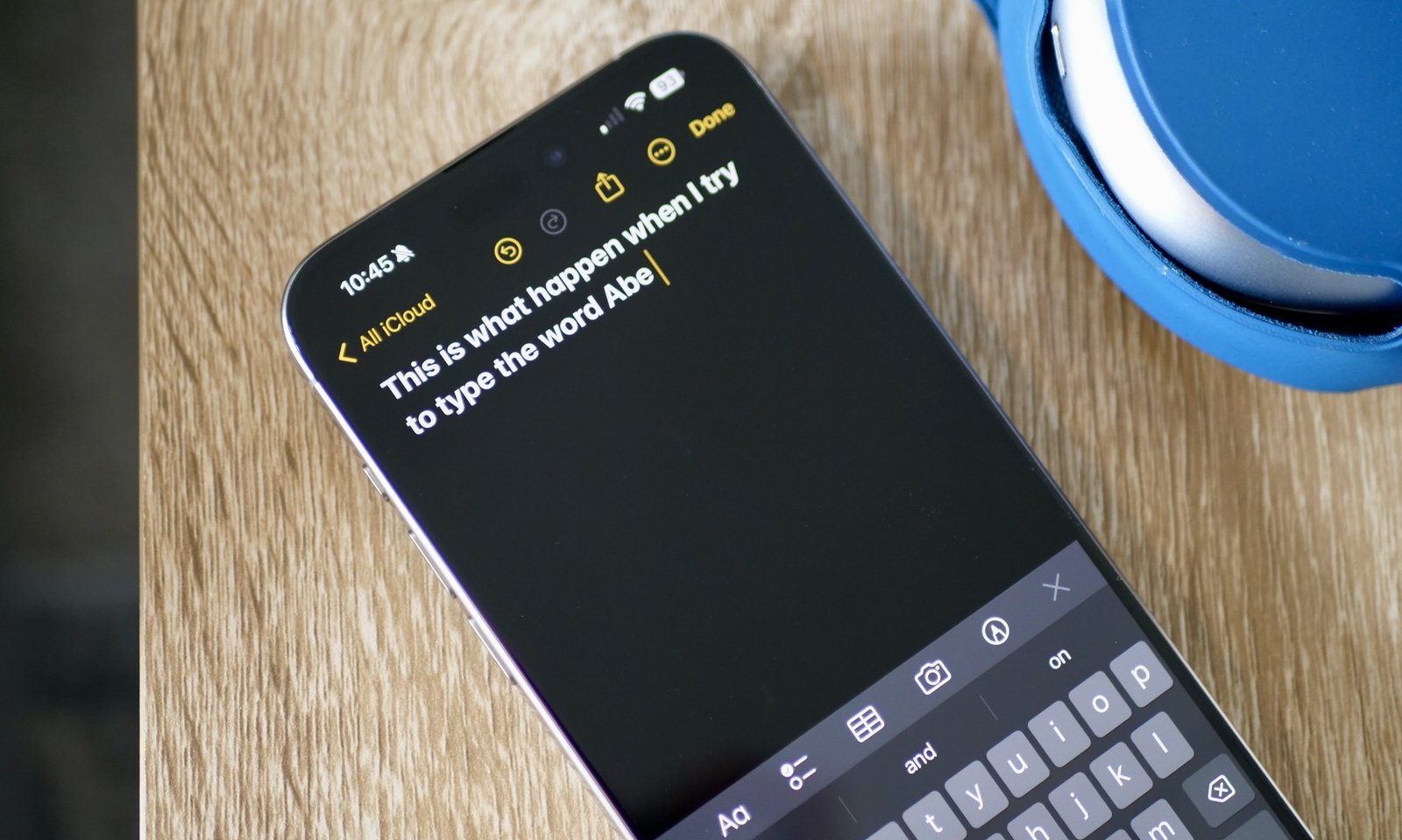 Words displayed on an iPhone's screen in the Notes app, with the keyboard below them.