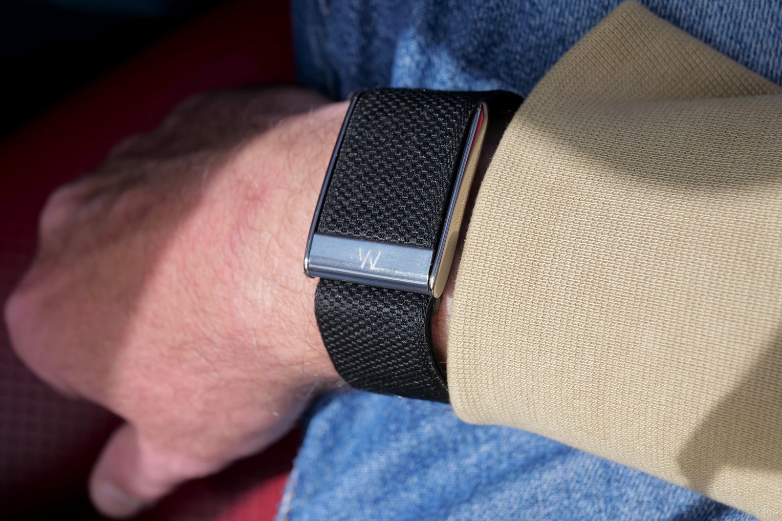 A person wearing the Whoop 5.0.
