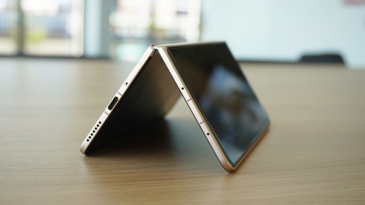 The bottom edges of the Magic V5, standing on a table
