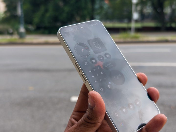 Side look at the display on the Nothing Phone 3 in white under direct sunlight
