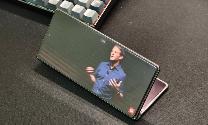 Watching videos on Vivo X Fold 5 foldable phone.