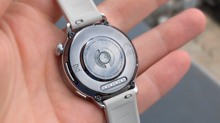 The rear of the OnePlus Watch 3 43mm, resting in a hand